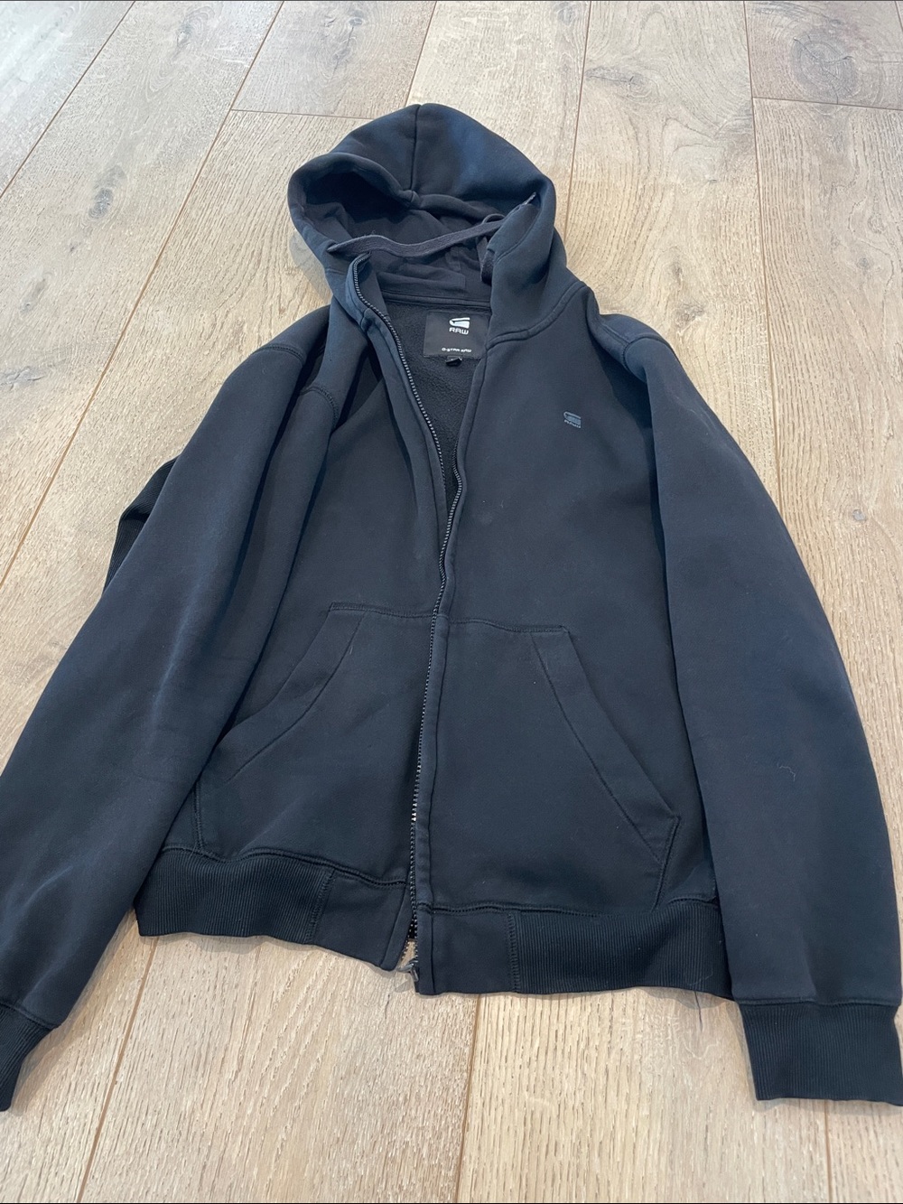 Men's Black Zip-Up Hooded Sweater with Subtle Logo